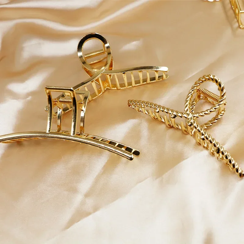 pince cheveux élégante dorée métallique