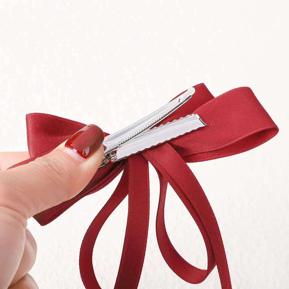 Élégantes pinces cheveux avec noeud