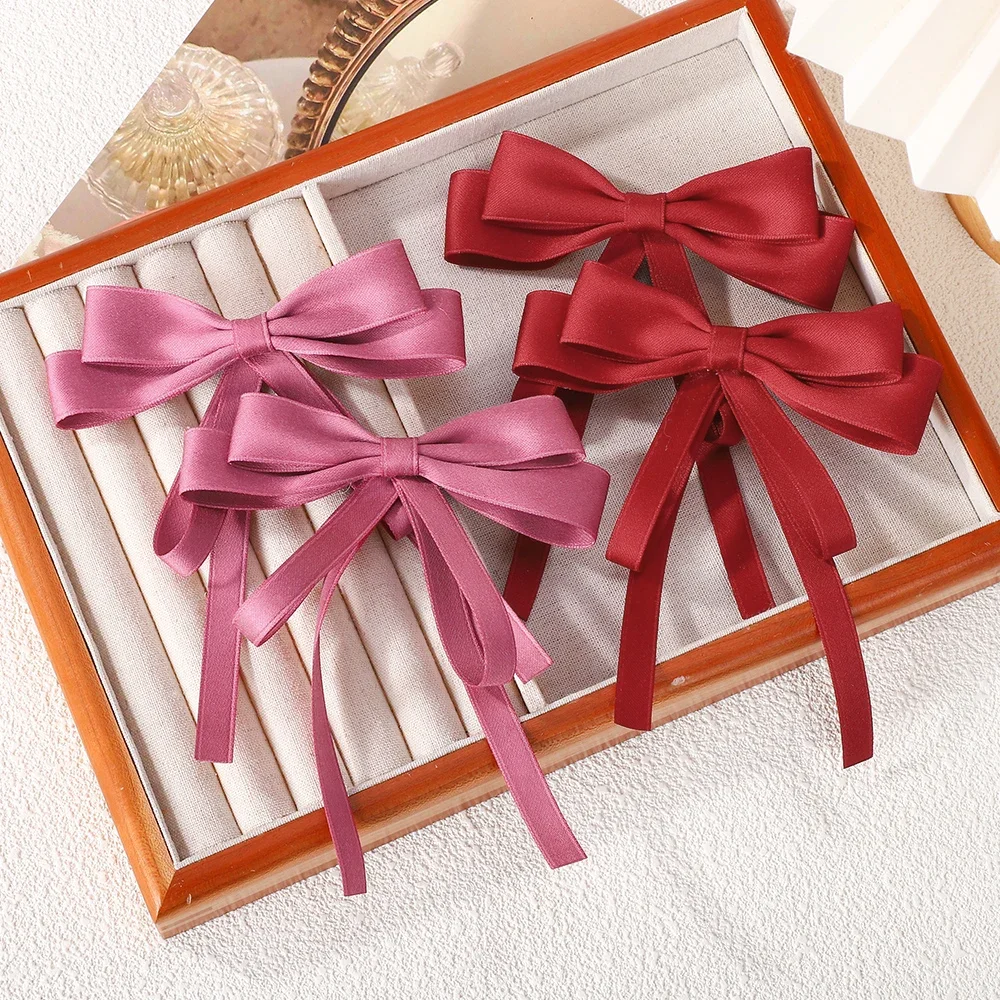 Élégantes pinces cheveux avec noeud