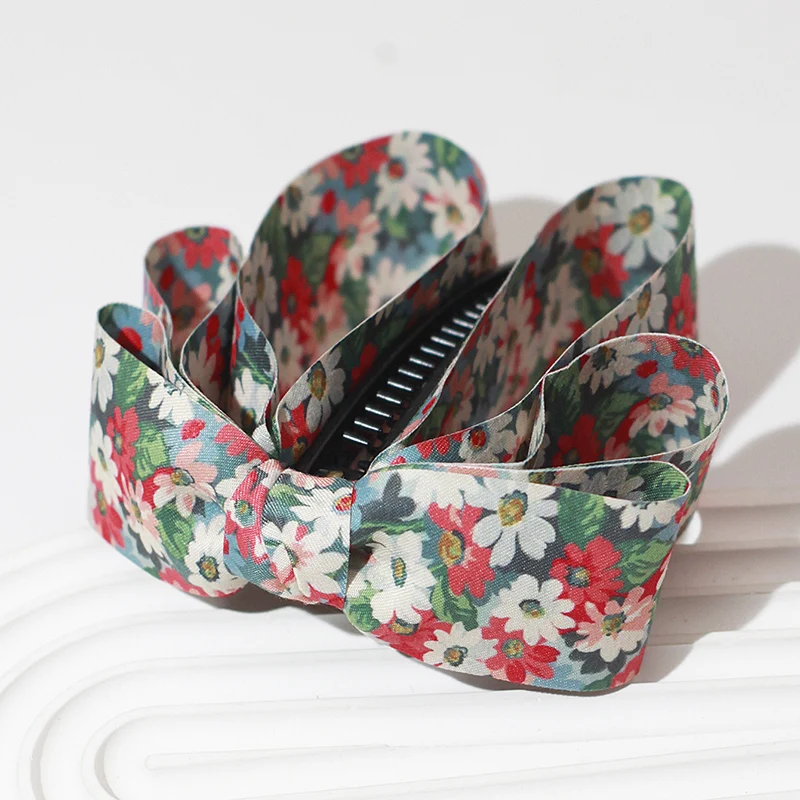 pince cheveux noeud tombant en tissu