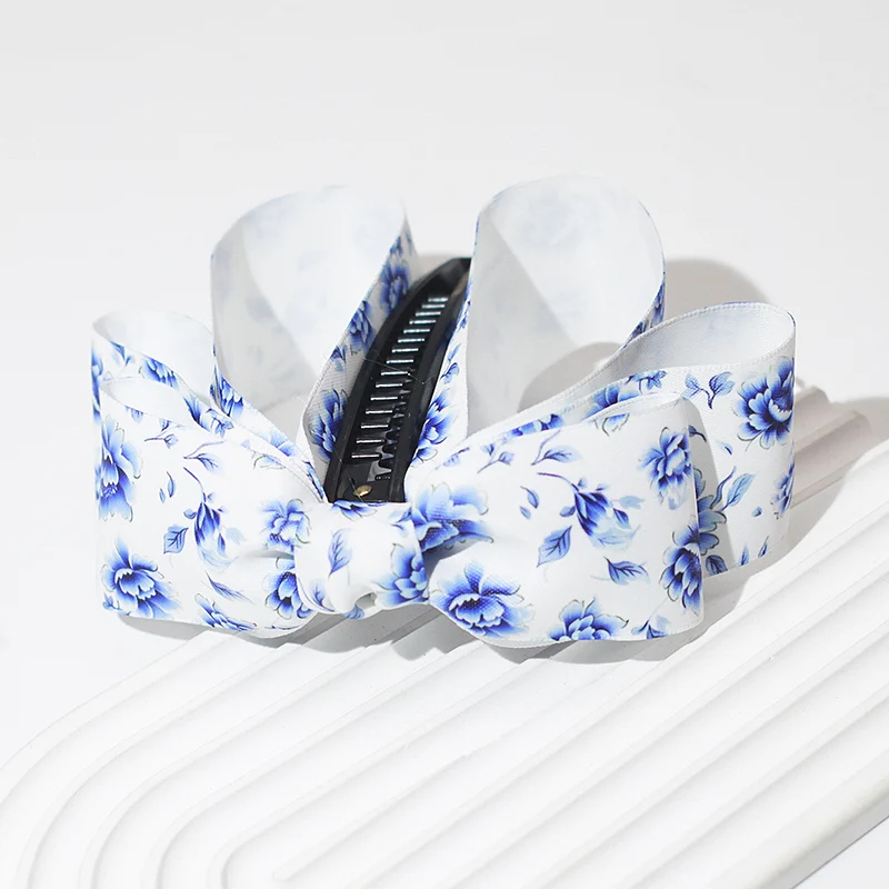 pince cheveux noeud tombant en tissu