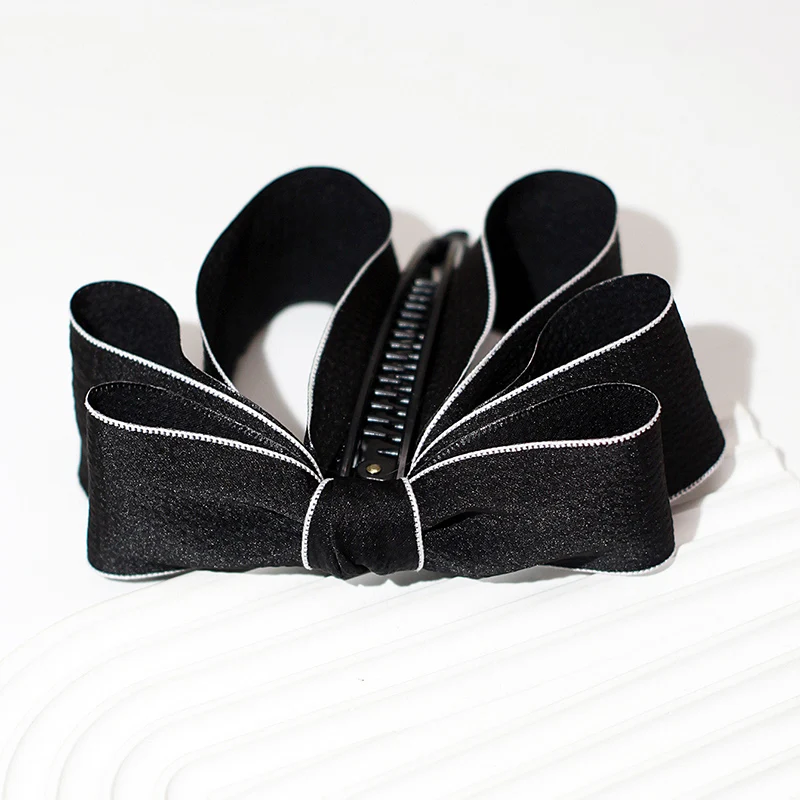 pince cheveux noeud tombant en tissu