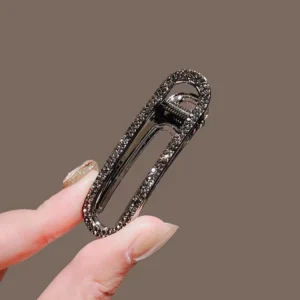 barrette cheveux en strass noirs pince bijou ovale en métal foncé