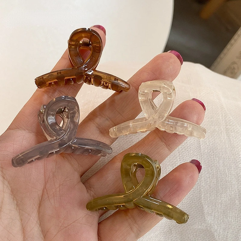 lot de 4 mini pinces crabe translucides design croisé demi queue