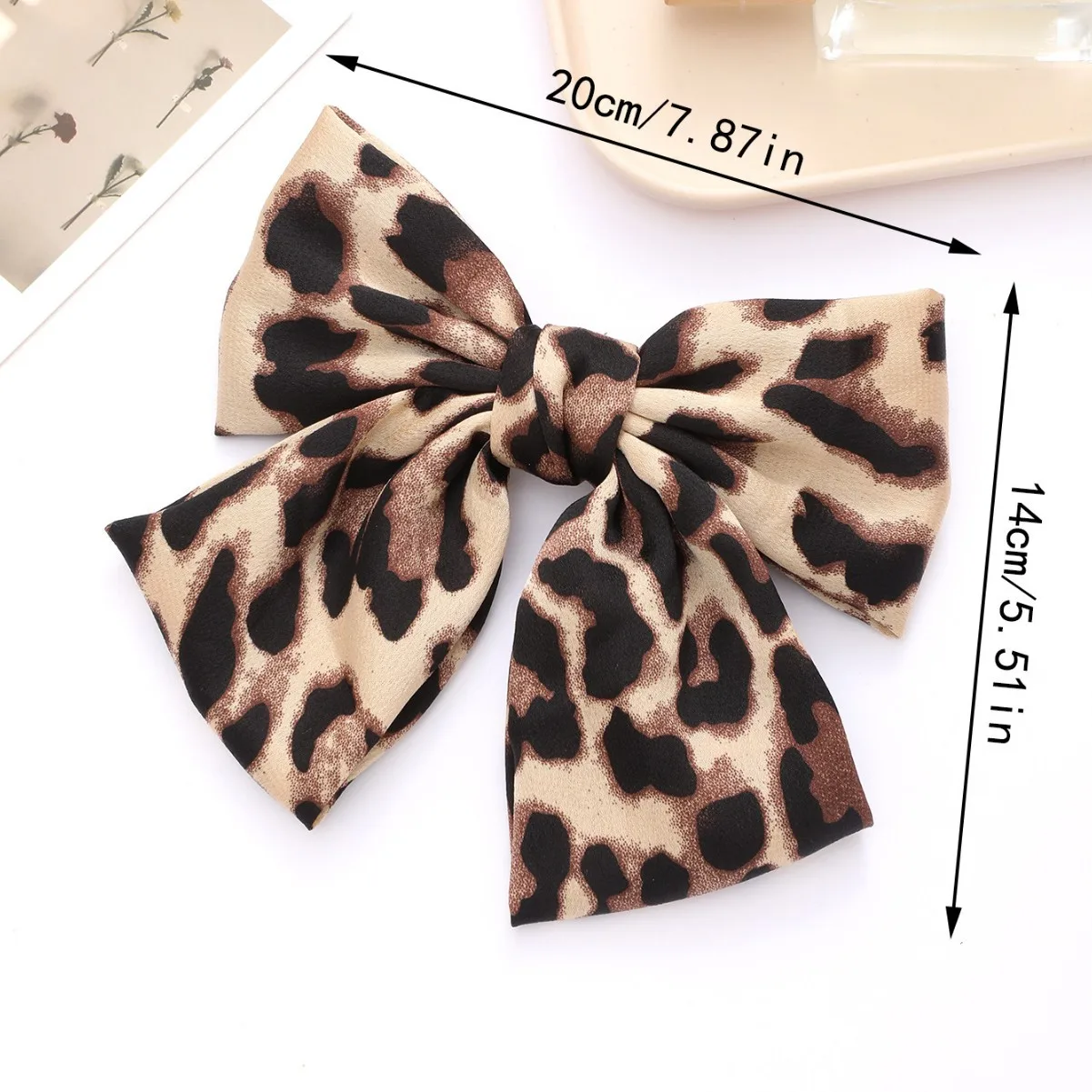barrette cheveux nœud léopard en tissu pince à ressort tendance