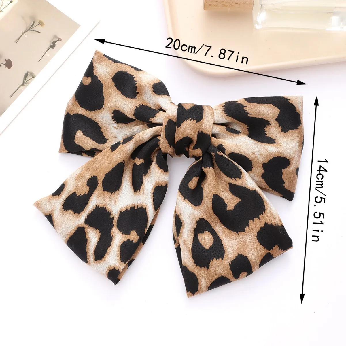 barrette cheveux nœud léopard en tissu pince à ressort tendance
