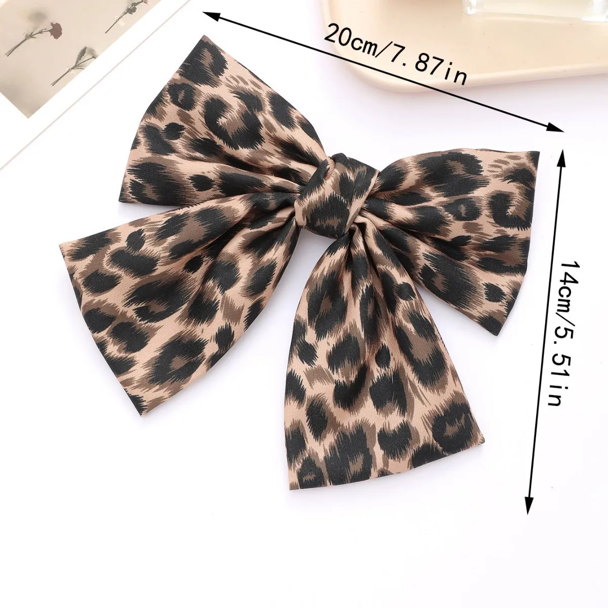 barrette cheveux nœud léopard en tissu pince à ressort tendance