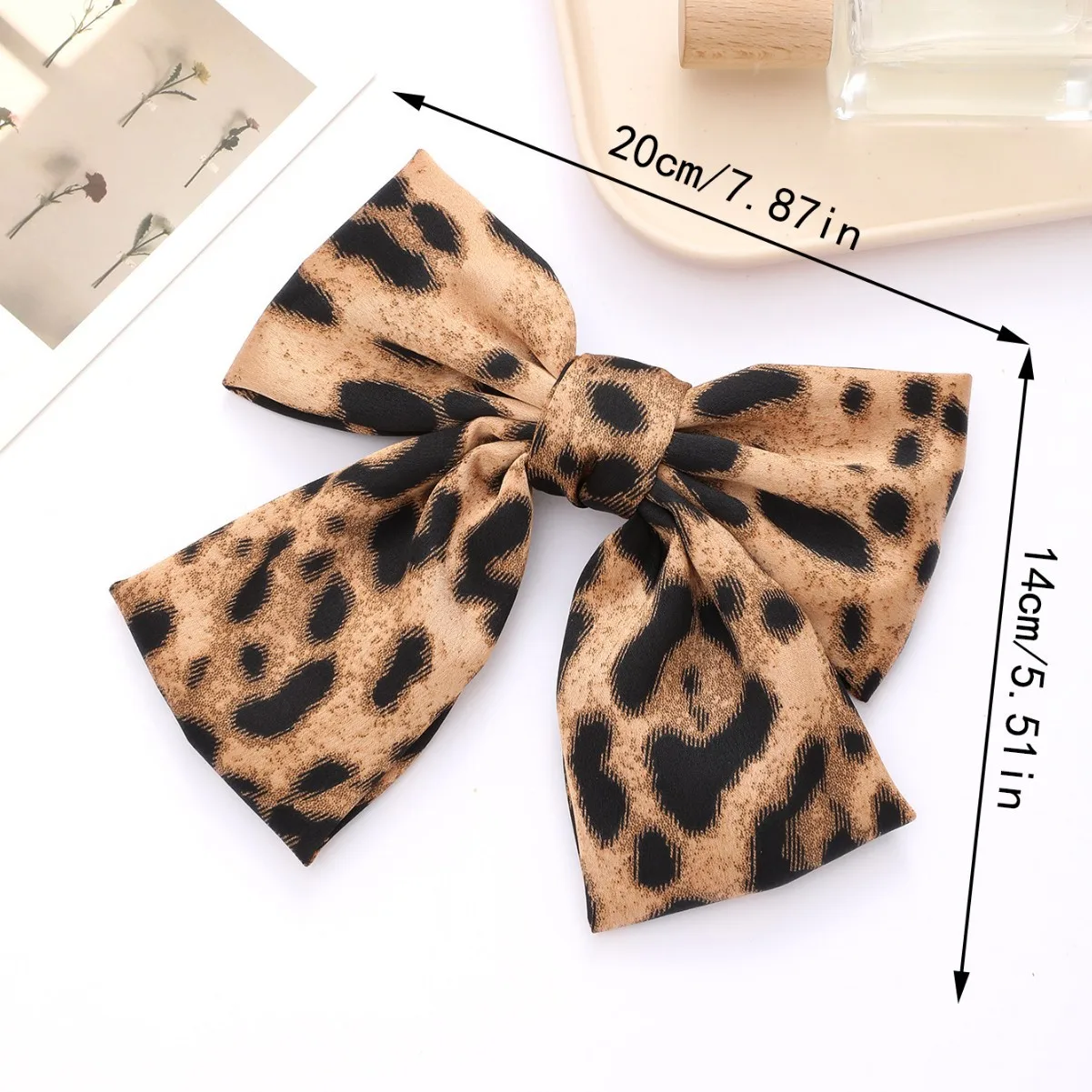 barrette cheveux nœud léopard en tissu pince à ressort tendance
