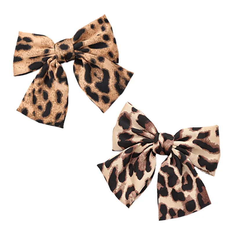 barrette cheveux nœud léopard en tissu pince à ressort tendance