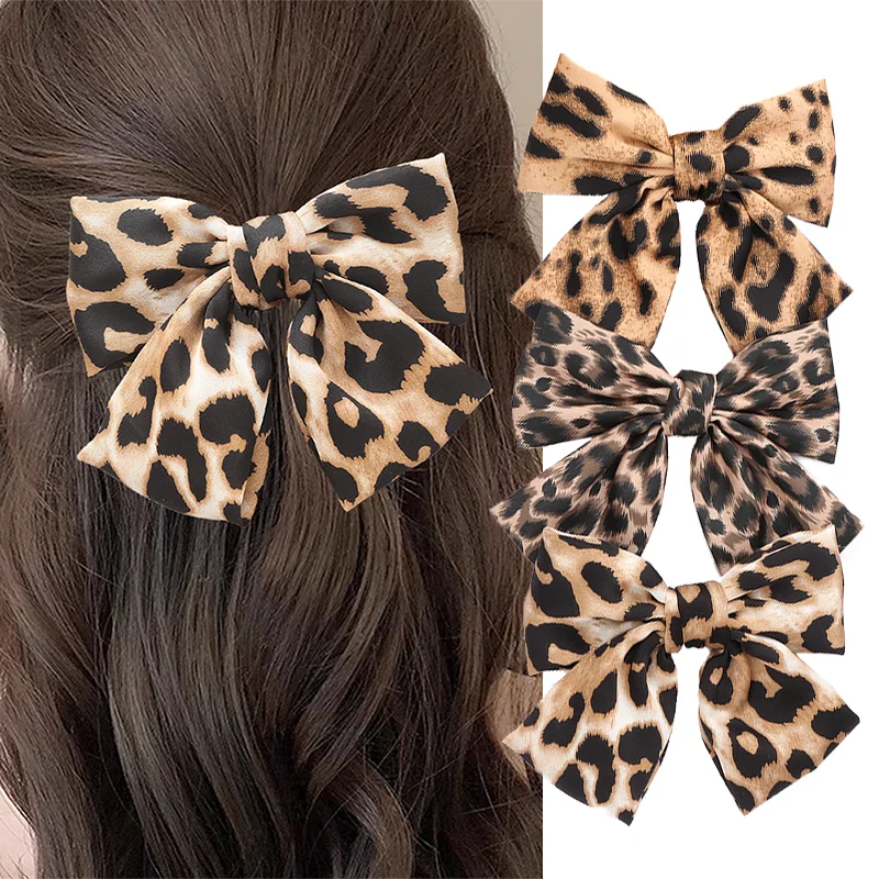 barrette cheveux nœud léopard en tissu pince à ressort tendance